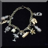J04. Costume jewelry charm bracelet. 